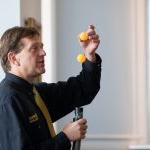 Physics professor Peter Sheldon gives a demonstration for the Physics Phun event during WildCat Weekend